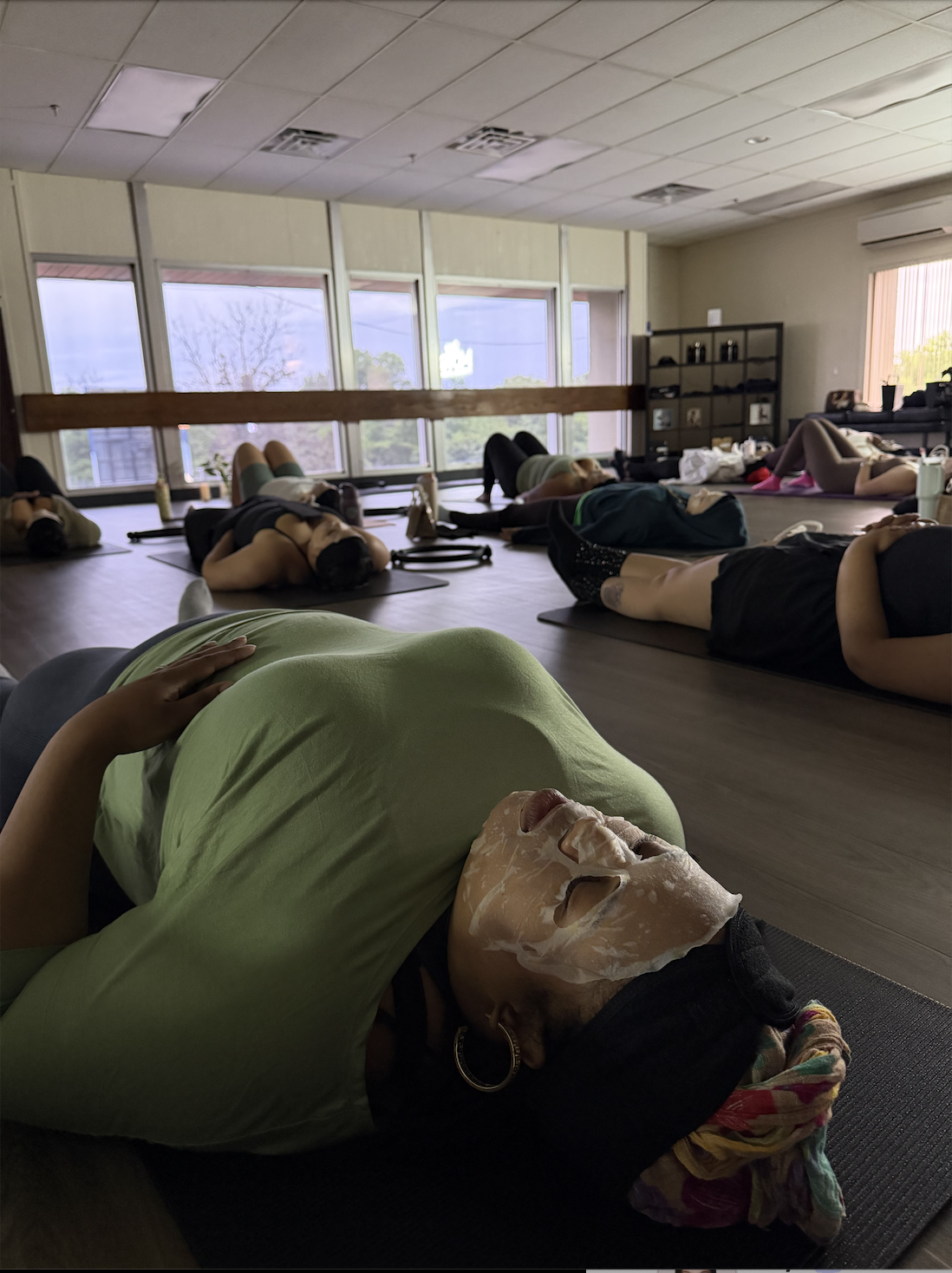 Guests enjoying face masks at a Good Anatomy gathering.